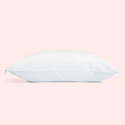 una imagen gif en un fondo rosado donde se muestra una almohada blanca y sobre ella una sandia que aparece y desaparece.